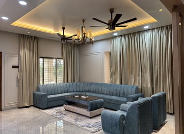 Luxury living room interior design in Palghar by Didhiti Design Studio
