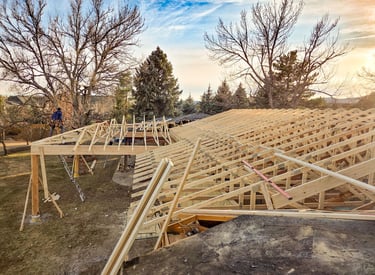 Structural roof truss system installation for a residential construction project in Lakewood, Colorado.