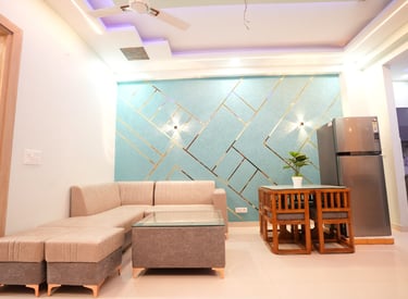 a living room with a couch and a table