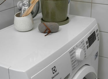 An energy-efficient washing machine being used to help lower utility bills