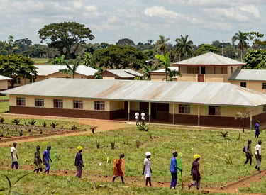 Community members collaborating on a sustainable development project in a Gambian village.