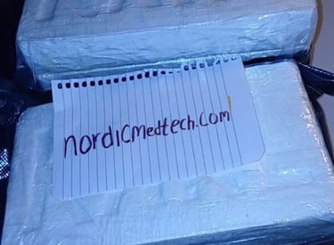 Two white shrink-wrapped rectangular bricks with KARL embossed, featuring a NordicMedTech note.