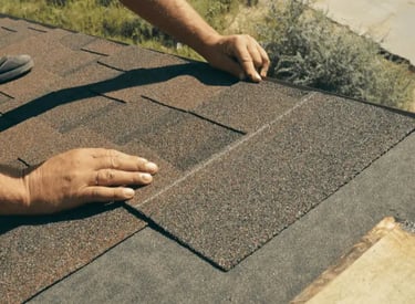 roofing in chelmsford, ma. Our skilled worker is doing some basic roof repair to client's home.