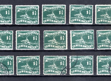 a collection of stamps with a picture of a man on a boat