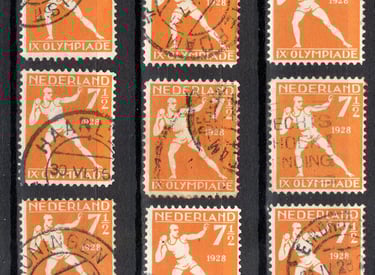 a collection of stamps stamps with a picture of a man in a baseball uniform