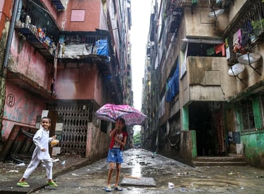 bad urban design of india showing pot filled roads in rainy season and unhygienic stay.