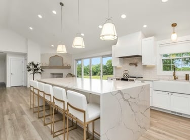 a kitchen with a marble counter top and a marble counter top