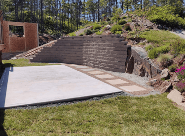 retaining wall and concrete pad