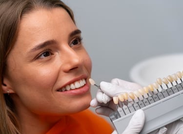 a woman in a dental care center with a smile on her face