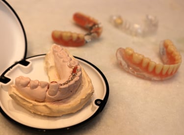 a plate with a tooth prosthesis on it