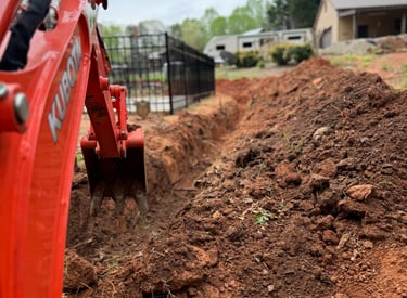 Excavation and trenching service in Newton NC for drainage installation and foundation preparation