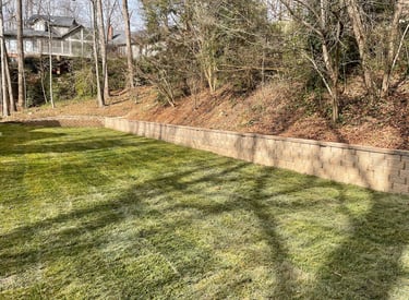 Segmental block retaining wall in Hickory NC designed for erosion control and yard protection