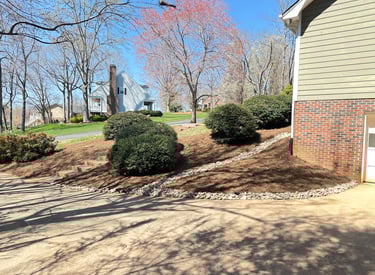 Fresh hardwood mulch installation in Catawba County NC around front foundation beds