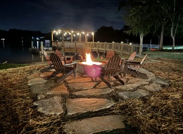 Outdoor fire pit installation in Newton NC with paver patio and seating area