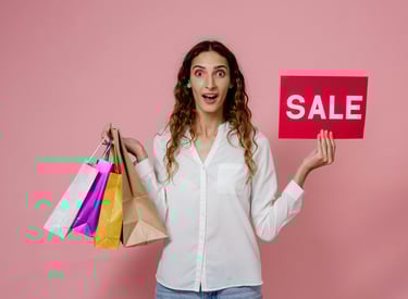 Shopper with bags and SALE sign