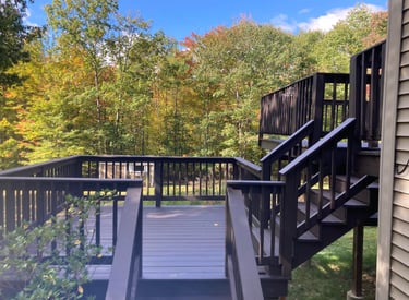 a staircase leading to a deck deck with a staircase