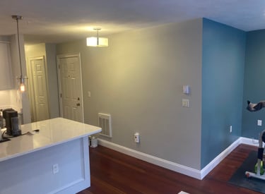 a kitchen with a large counter top and a bike