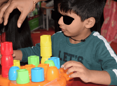 Kid with Learning disorder undergoing ABA Therapy