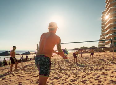 A volleyball game on Rocky Point beach with friends.