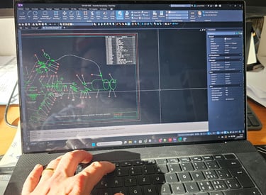a person is using a laptop computer and a laptop