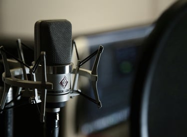 a microphone in a recording studio