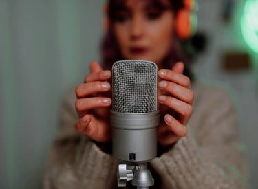 a woman holding a microphone in front of her
