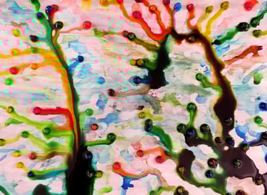 Streaks of colored paint from melting ice