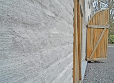 a wooden fenced in area with a gated in area with a gated