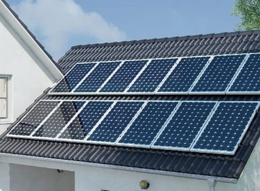 Residential rooftop solar panels installed on a dark shingle roof for clean energy power.
