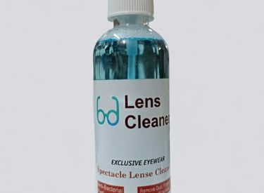 a bottle of lens lens cleaner with a spray bottle