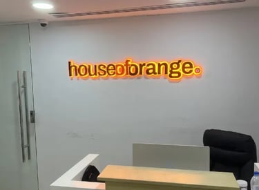 House of orange indor 3D acrylic backlit signage mounted on wall