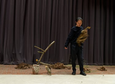 Ikebana performance featuring Monkey Puzzle Tree at CREATURE London Metropolitan University