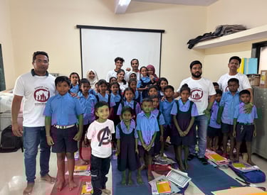 donoriam team with school children