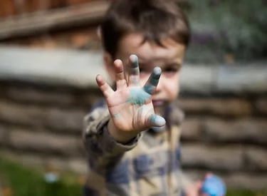 Toddler doing sensory play 