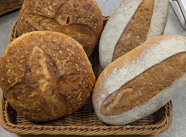 Fresh bread in a basket at Westbury-sub-Mendip Community Shop