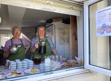 Westbury-sub-Mendip Community Shop volunteers serving tea and coffee