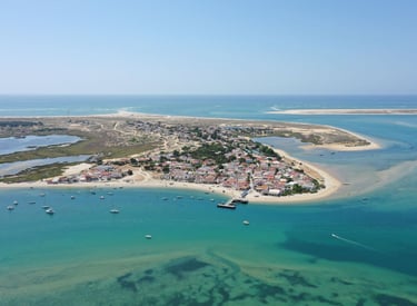a small island with a small island in the middle of the ocean