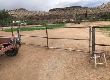 gated metal fence that Prescott Welding Company built