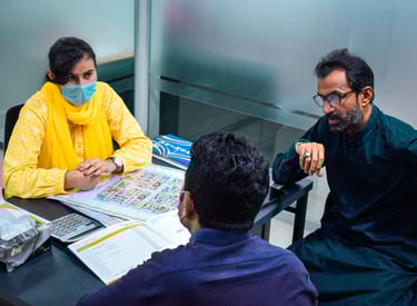 malik enterprises sales team working with grocery store owner to add more ethnic products