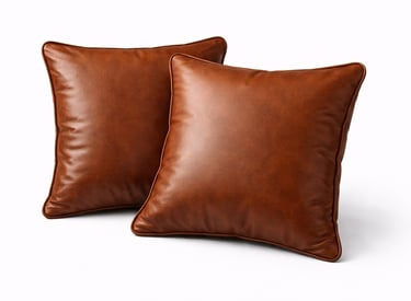 Square leather cushions with smooth texture used for sofa styling and interior decoration.