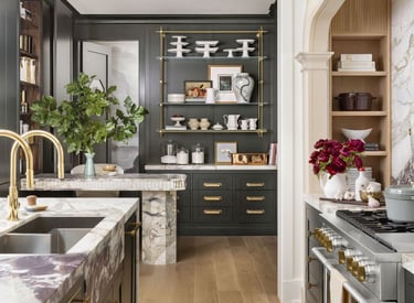 a kitchen with a marble counter top and a marble counter top
