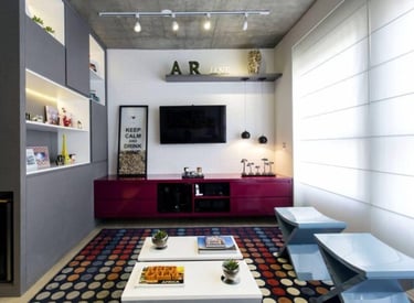 a living room with a television and a couch