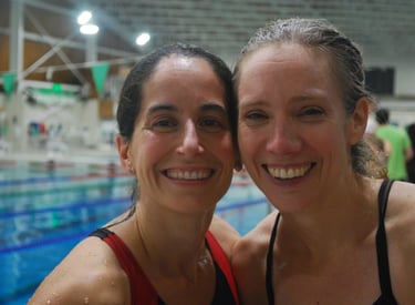 two swimmers smiling