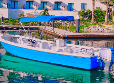 a boat in the water with a blue sky in the background