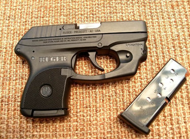 Ruger lcp with laser sight and an extra mag