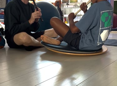 music teach and child on recorder