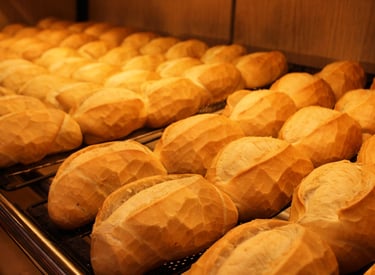 a bunch of breaded breaded breads on a rack