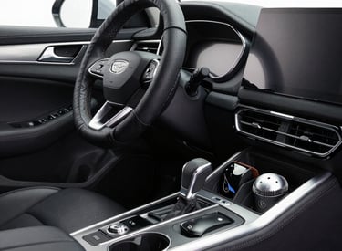 Image showing a display of automotive accessories like seat covers, floor mats, and steering wheel covers.