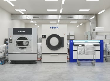Industrial laundry room featuring Fossa professional washing machines and dryer equipment.