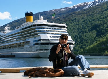 Een moment tussen het reizen door: met camera aan een Noorse fjord tijdens mijn tijd op de Costa For